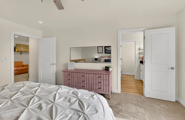 a bedroom with a bed and a cabinets