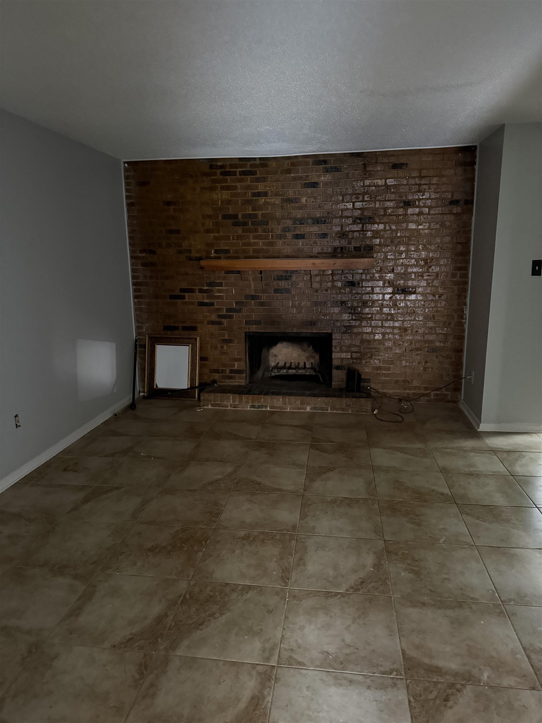 6435 Kirby Trees Drive, Unit 6435 Memphis, TN 38115 - Photo 2 of 8 a room with a fireplace