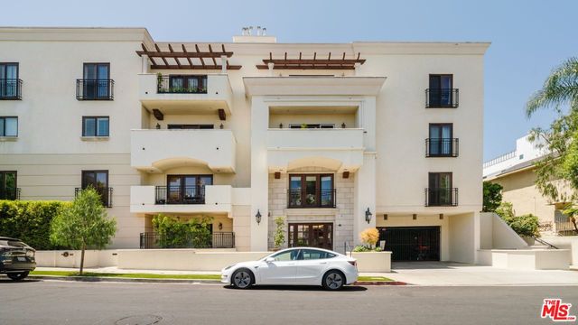 a view of a terrace with chairs