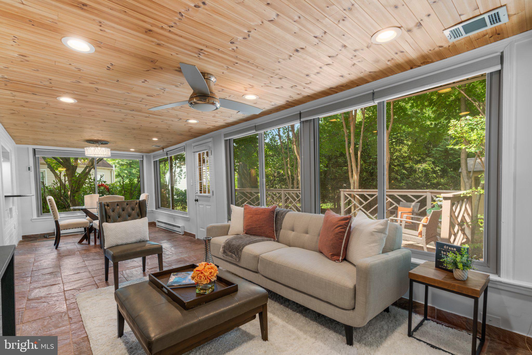 1605 Gridley Lane Silver Spring, MD 20902 - Photo 15 of 42 Walls of glass surrounds this beautiful room.