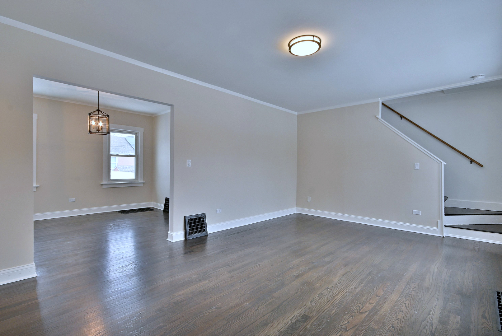9016 Southview Avenue Brookfield, IL 60513 - Photo 14 of 45 an empty room with wooden floor and windows