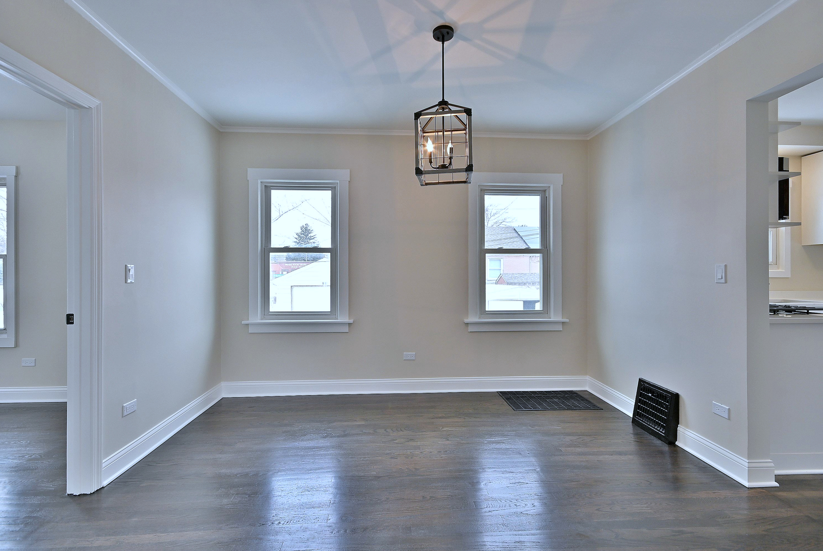 9016 Southview Avenue Brookfield, IL 60513 - Photo 16 of 45 a view of an empty room with wooden floor and a window