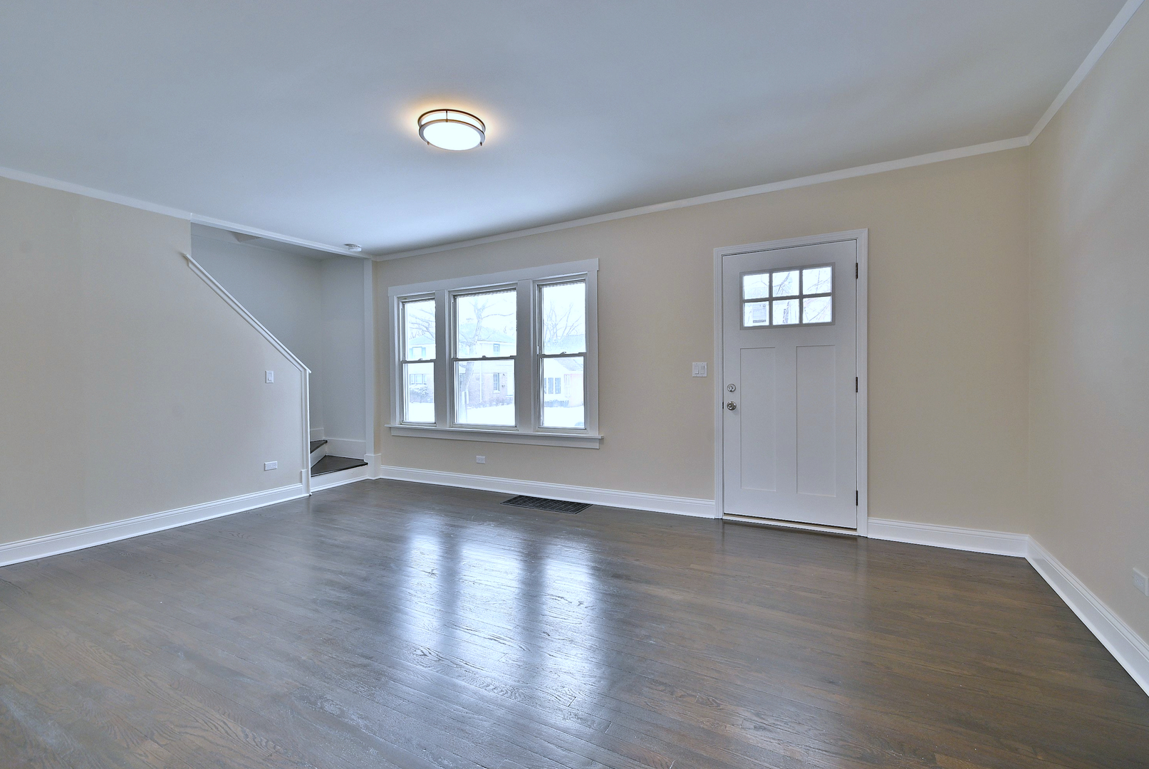 9016 Southview Avenue Brookfield, IL 60513 - Photo 17 of 45 an empty room with wooden floor and windows