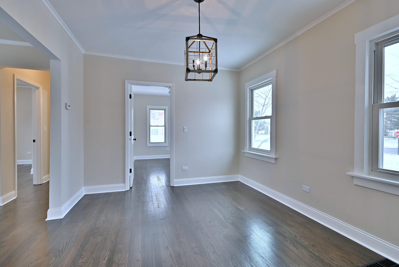 9016 Southview Avenue Brookfield, IL 60513 - Photo 18 of 45 a view of a room with wooden floor and windows