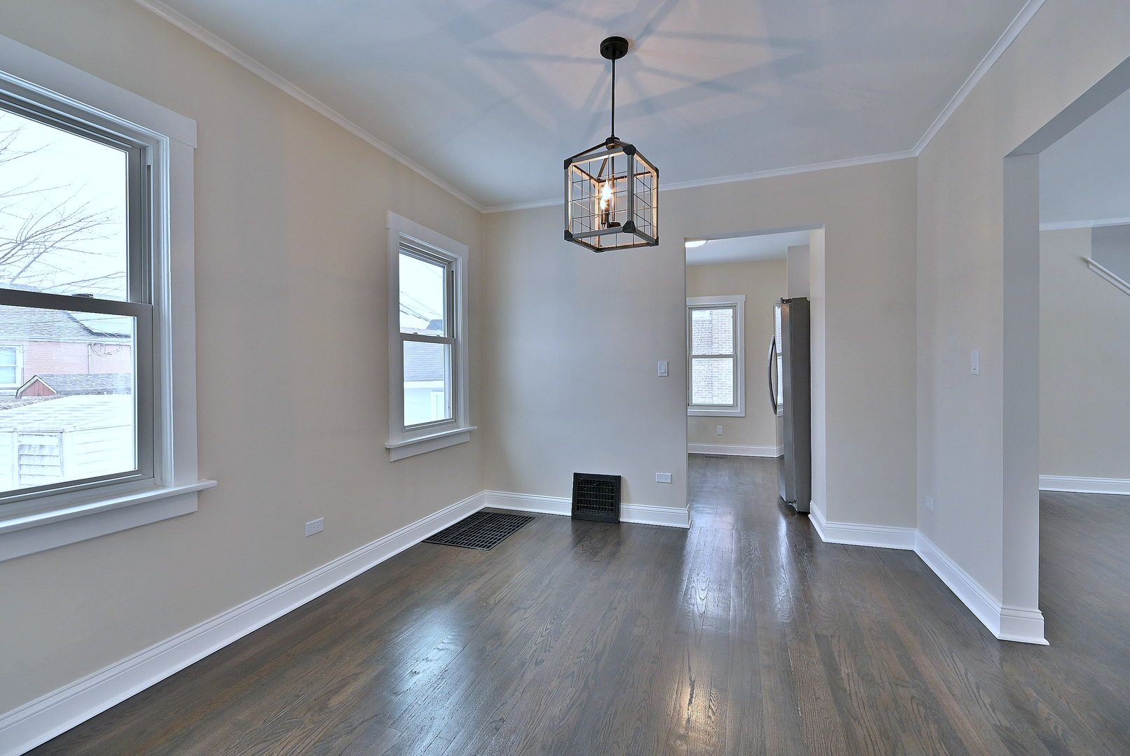 9016 Southview Avenue Brookfield, IL 60513 - Photo 19 of 45 a view of empty room with wooden floor and window