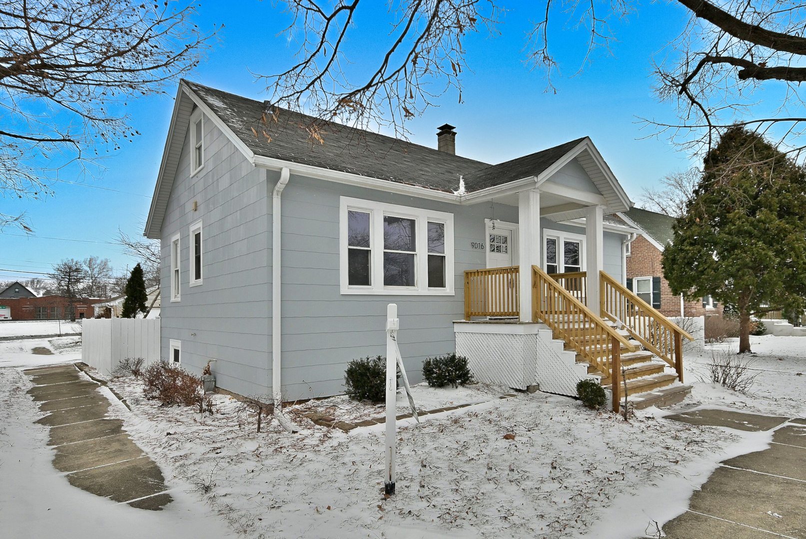 9016 Southview Avenue Brookfield, IL 60513 - Photo 2 of 45 a view of a house with a snow in the yard