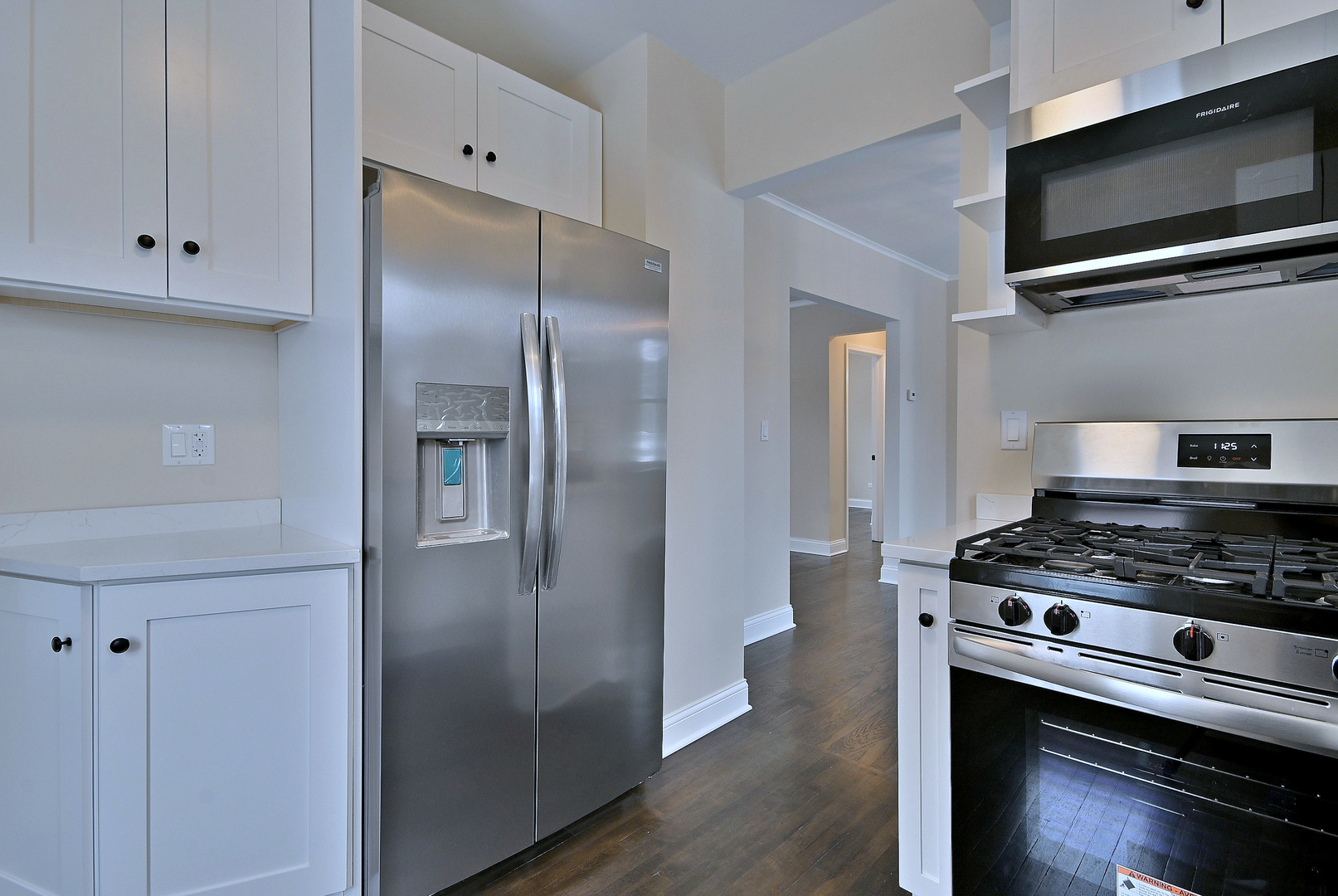 9016 Southview Avenue Brookfield, IL 60513 - Photo 23 of 45 a kitchen with stainless steel appliances granite countertop a stove and a refrigerator