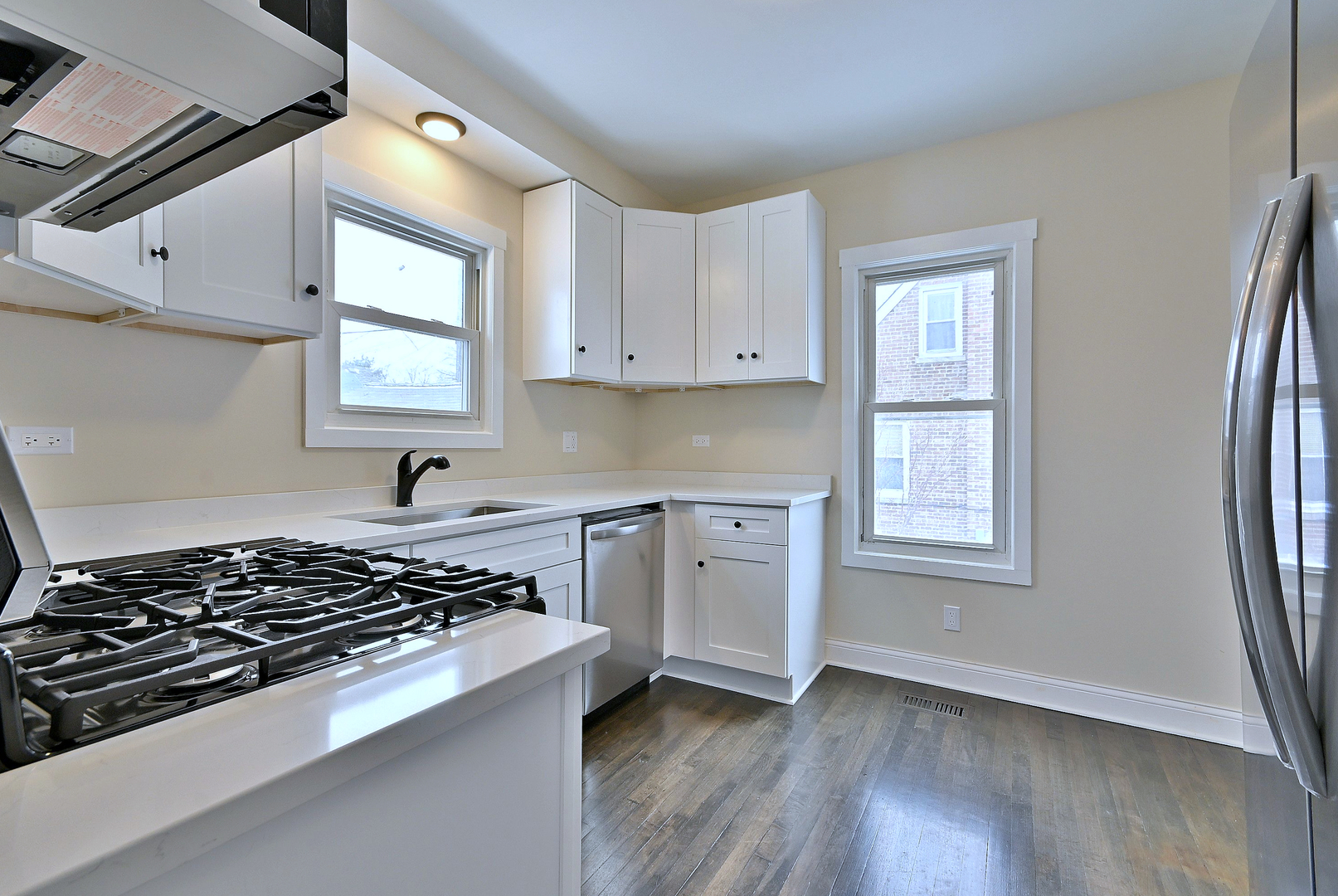 9016 Southview Avenue Brookfield, IL 60513 - Photo 25 of 45 a kitchen with wooden cabinets and a stove top oven