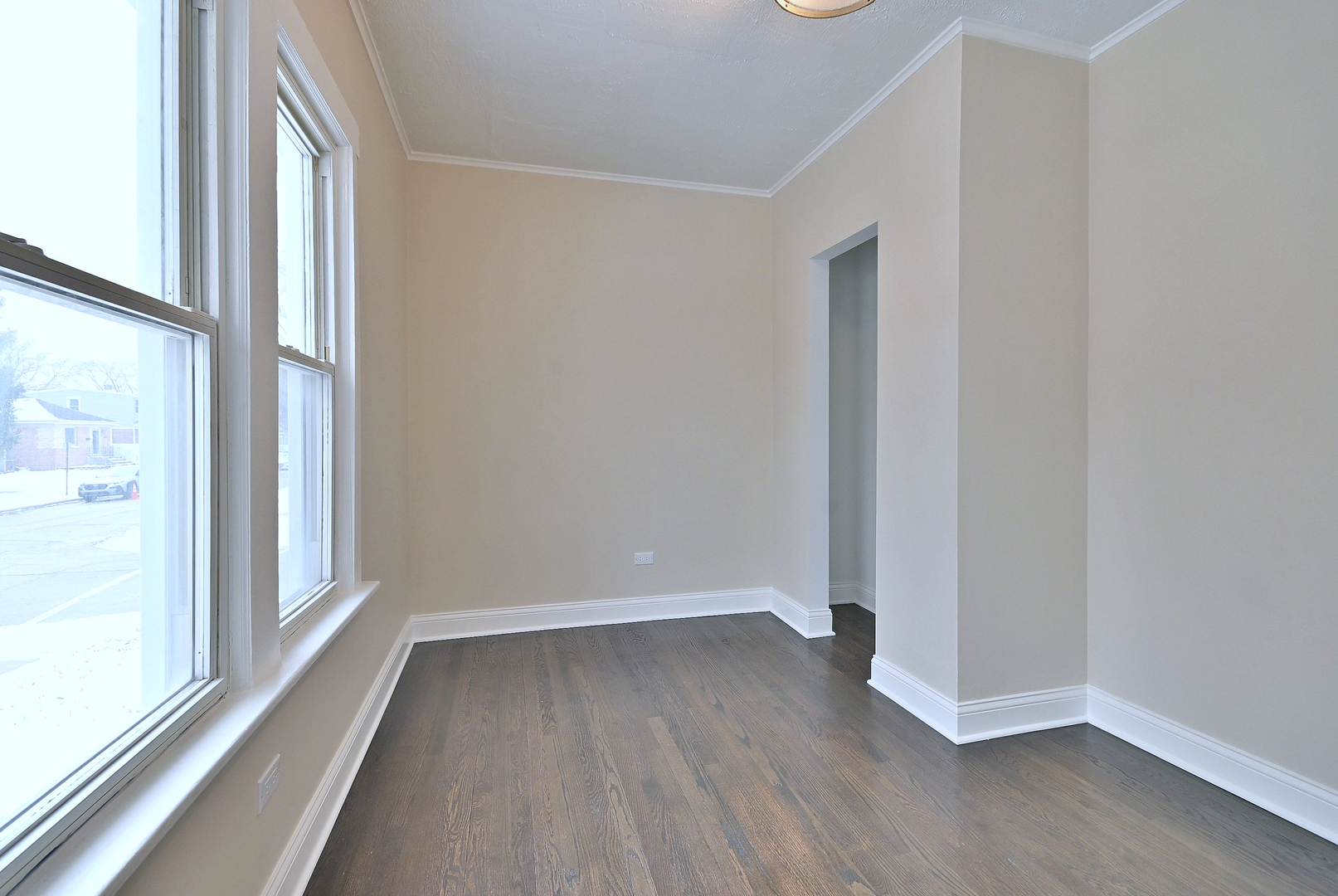 9016 Southview Avenue Brookfield, IL 60513 - Photo 28 of 45 an empty room with wooden floor and windows