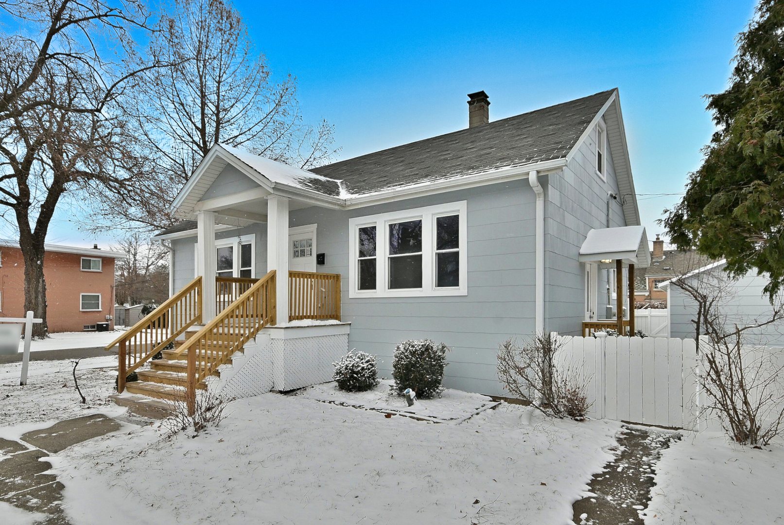 9016 Southview Avenue Brookfield, IL 60513 - Photo 3 of 45 a front view of a house with a yard