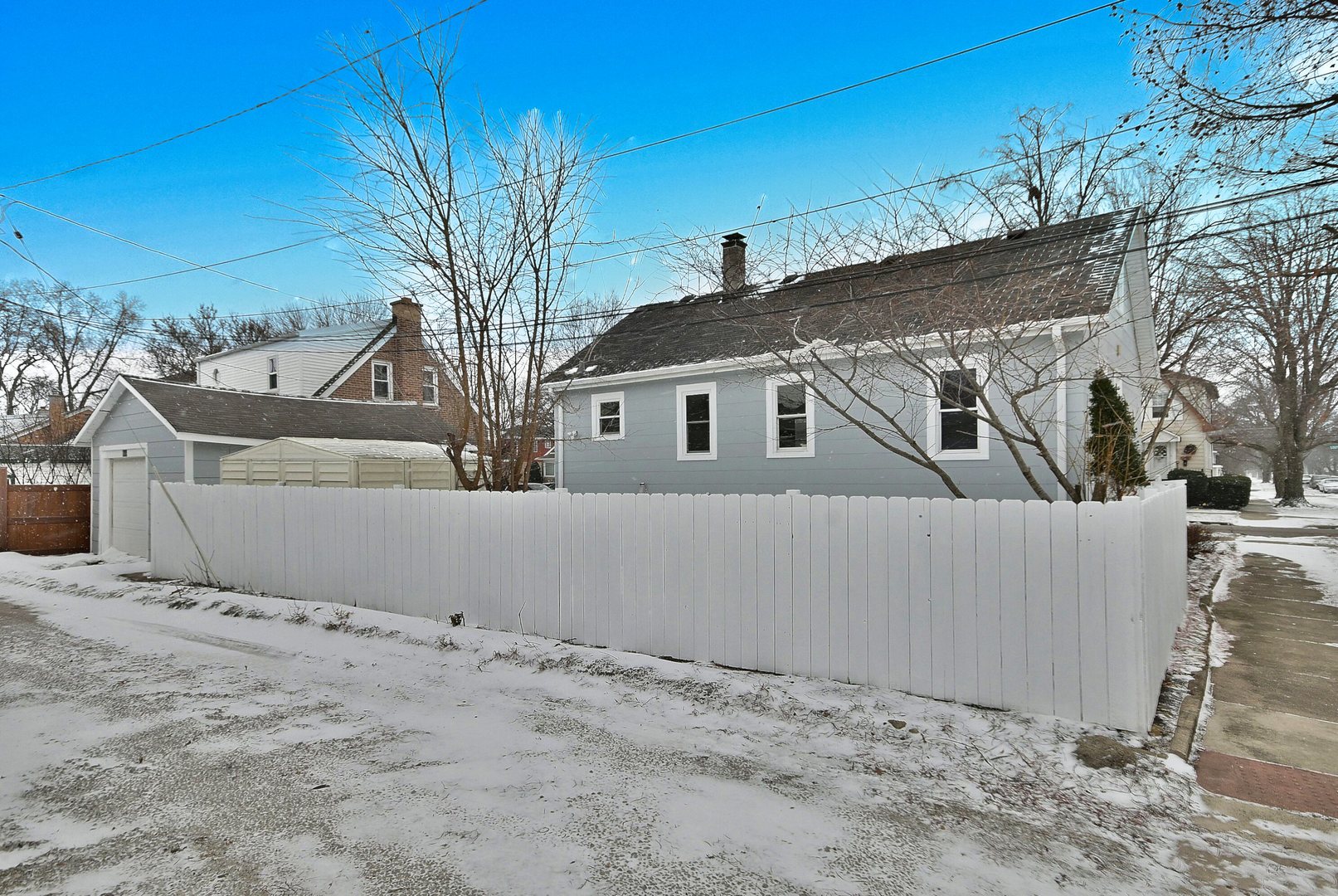 9016 Southview Avenue Brookfield, IL 60513 - Photo 4 of 45 a view of a house with a snow