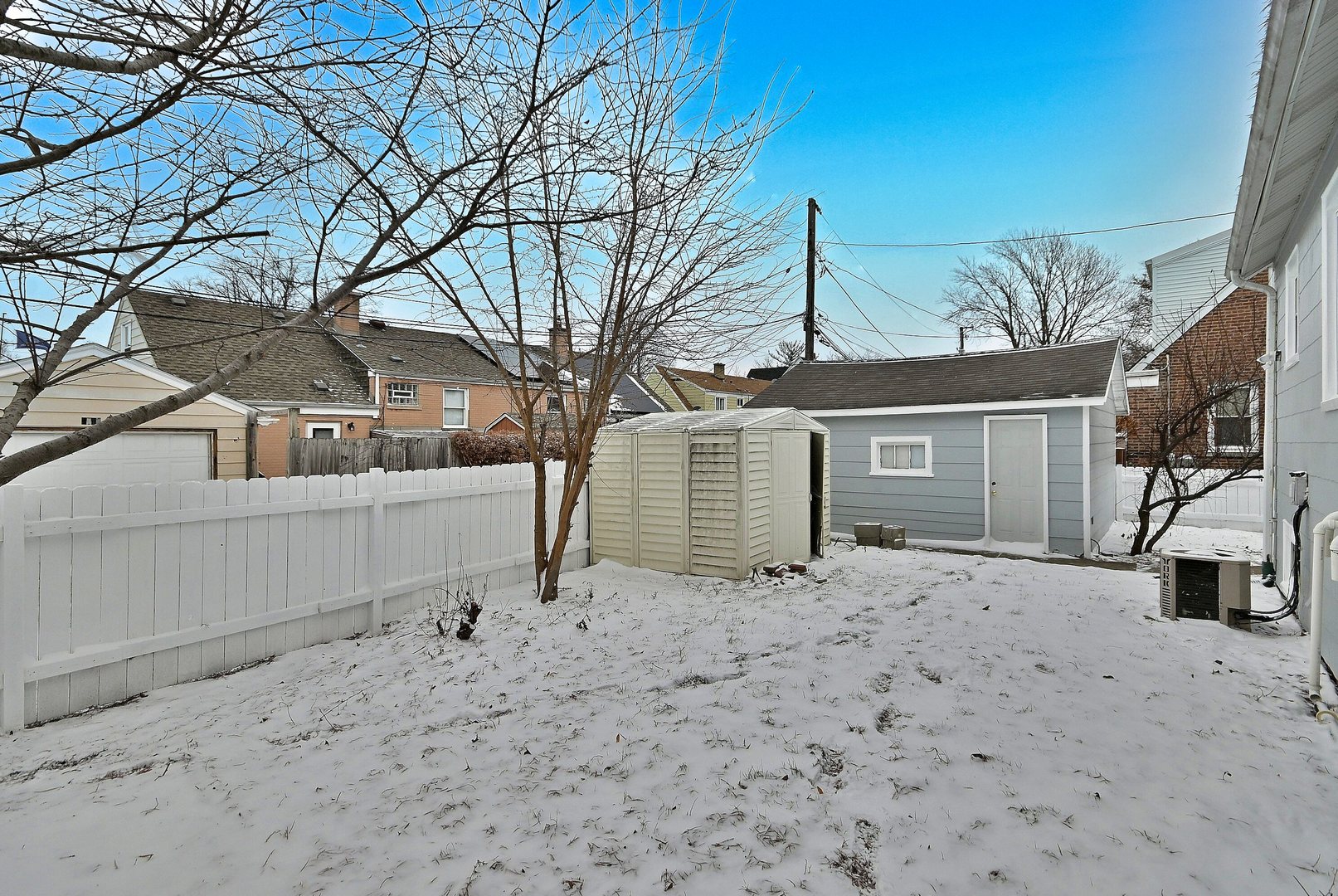 9016 Southview Avenue Brookfield, IL 60513 - Photo 6 of 45 a view of a house with a snow in the yard