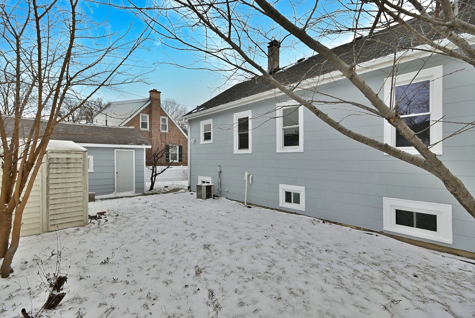 9016 Southview Avenue Brookfield, IL 60513 - Photo 7 of 45 a view of a house with a yard