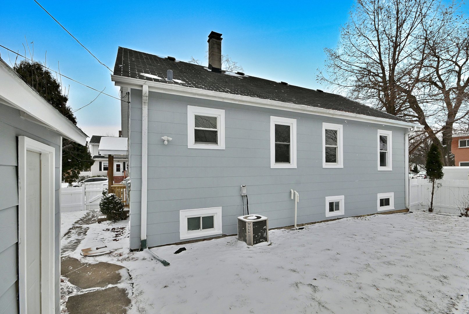 9016 Southview Avenue Brookfield, IL 60513 - Photo 9 of 45 a front view of a house with a yard