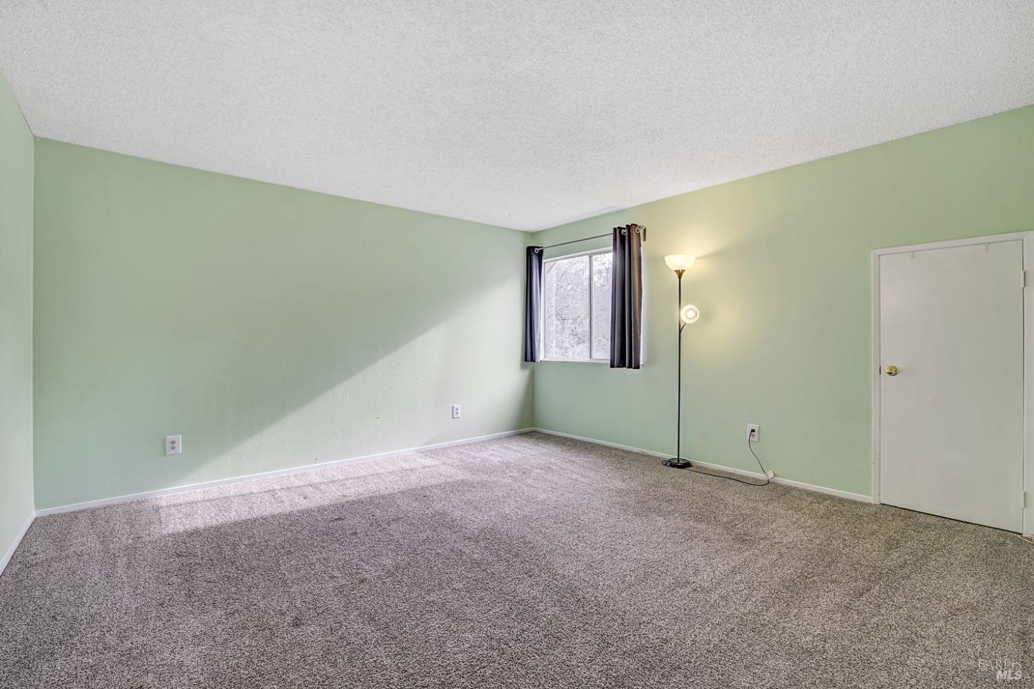 870 Hudis Street Rohnert Park, CA 94928 - Photo 20 of 49 a view of an empty room with window
