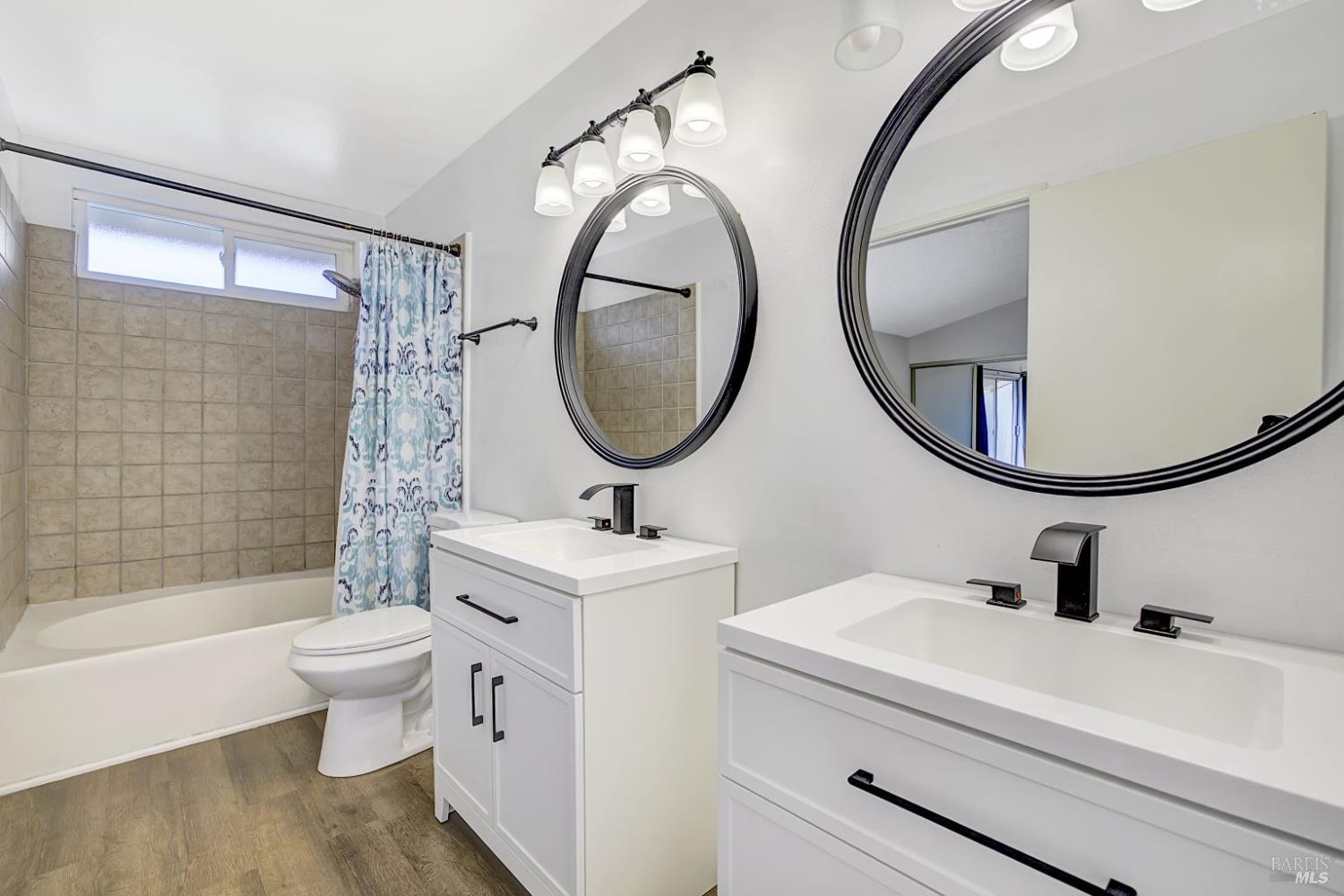 870 Hudis Street Rohnert Park, CA 94928 - Photo 29 of 49 a bathroom with a sink and a mirror