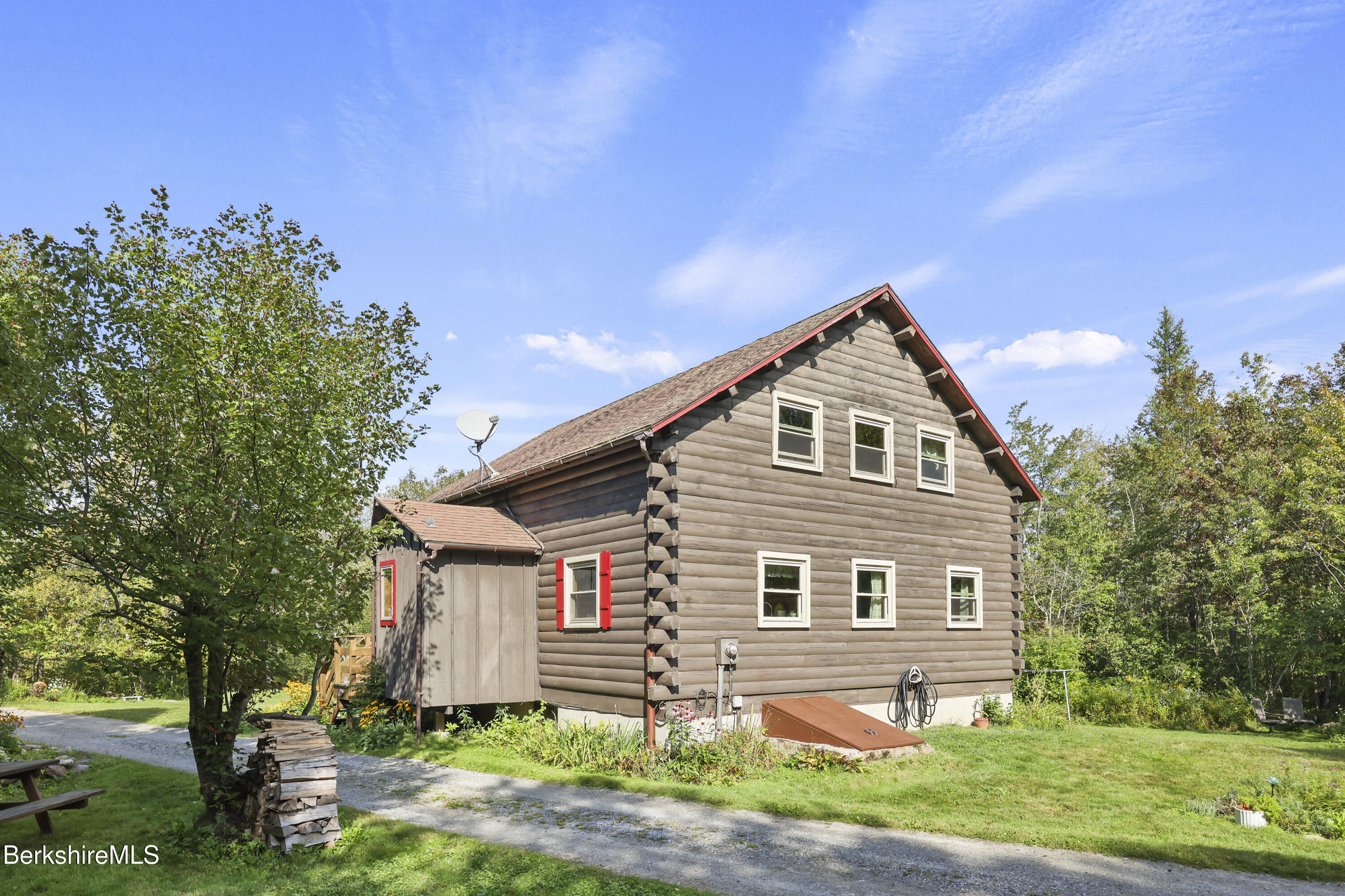 78 East Main Road Peru, MA 01235 - Photo 43 of 56 a front view of a house with garden