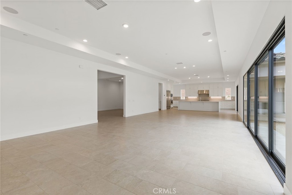 11936 Northstar Lane Porter Ranch, CA 91326 - Photo 2 of 26 Great Room: Saddleback Italianate - Ridge Collection at Bella Vista - Photo of another Saddleback - Not actual home for sale - Home is still under construction - Estimated delivery of September 2026
