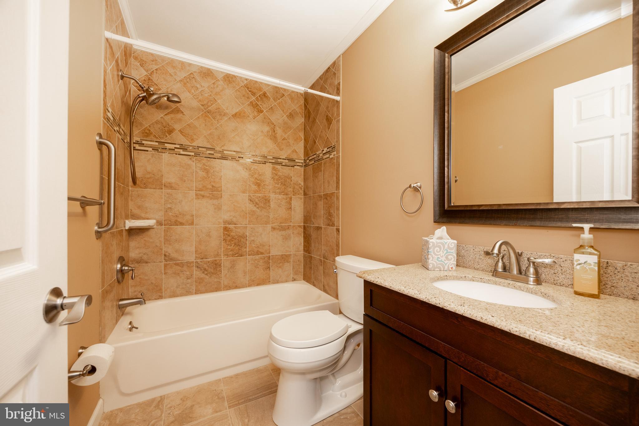 5 Cheyenne Road Royersford, PA 19468 - Photo 15 of 29 a bathroom with a sink a toilet and a bathtub
