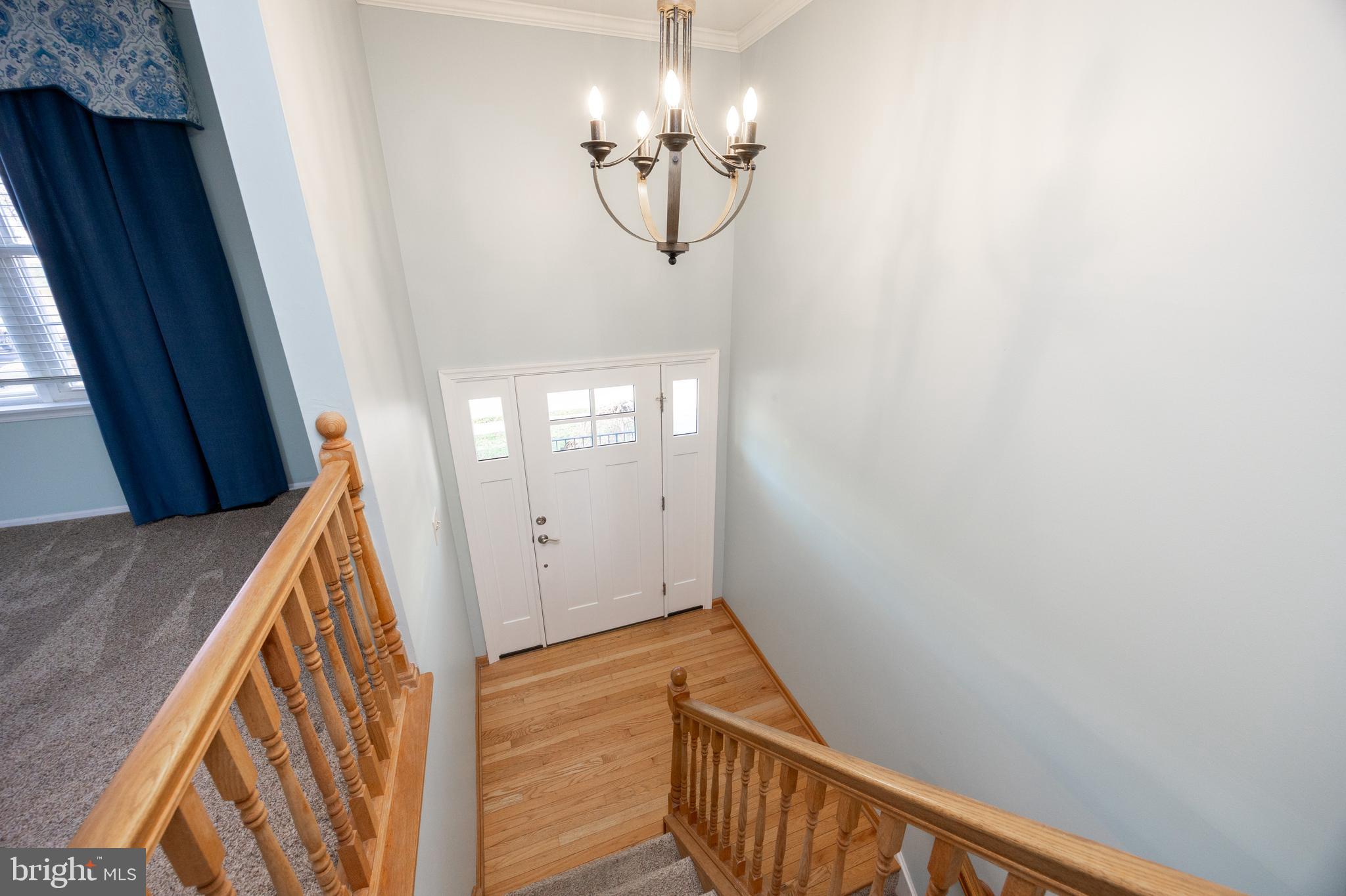 5 Cheyenne Road Royersford, PA 19468 - Photo 6 of 29 a view of a hallway with chandelier