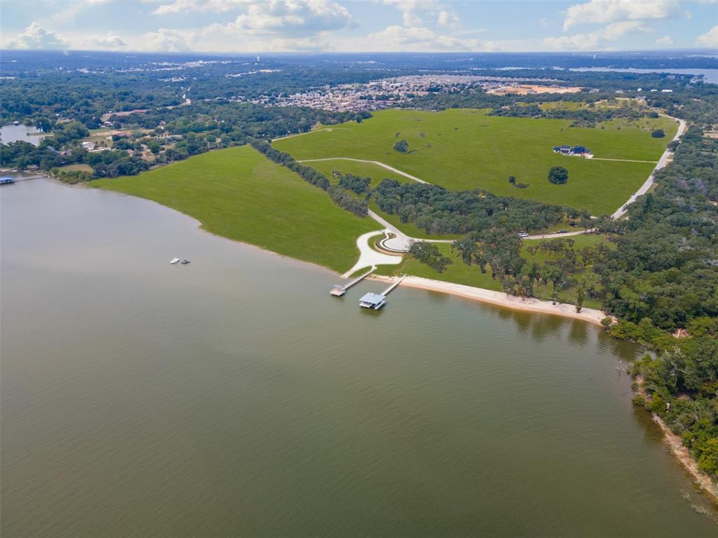 1532 Park Street Azle, TX 76020 - Photo 4 of 19 a view of a swimming pool with a lake view and mountain view