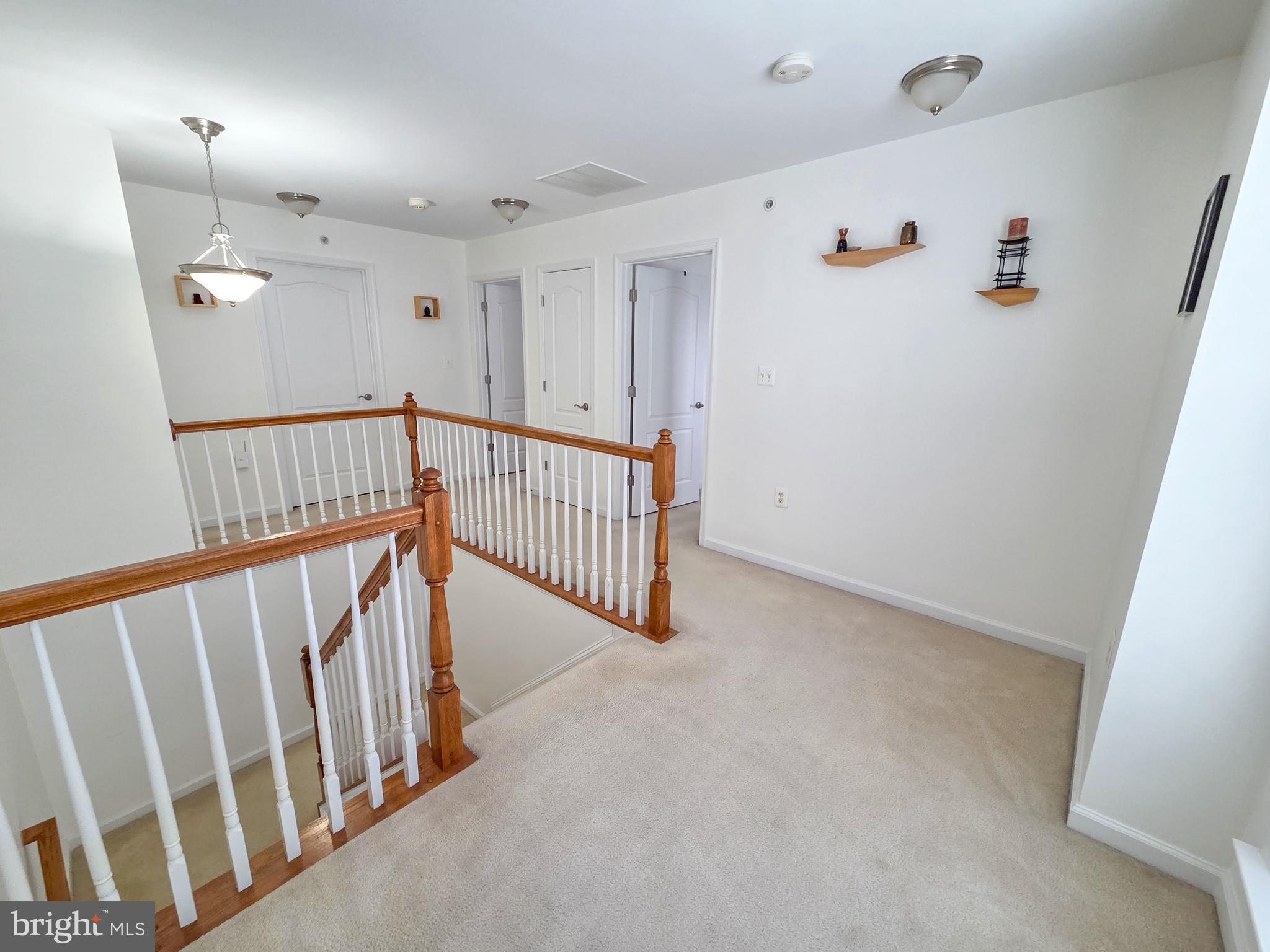 2216 Highfly Terrace, Unit 2216 Silver Spring, MD 20902 - Photo 14 of 19 Upstairs Landing