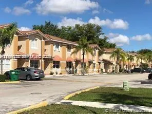 a view of a street with houses