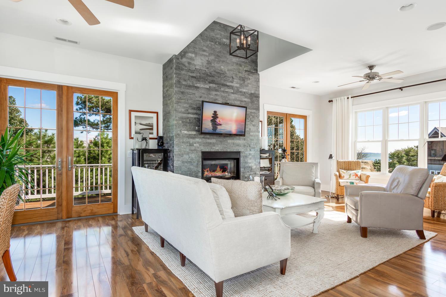 21388 Ferry Landing Road Tilghman, MD 21671 - Photo 17 of 54 Great Room with two accesses to porch
