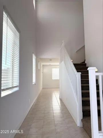 a view of a hallway with windows