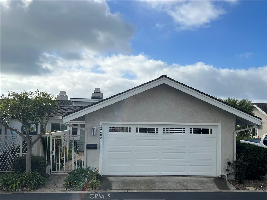 24682 Seacall Way Dana Point, CA 92629 - Photo 2 of 3 a view of a house with a garage
