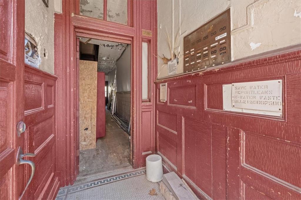 245 Bond Street Brooklyn, NY 11217 - Photo 6 of 11 a view of a door and brick walls