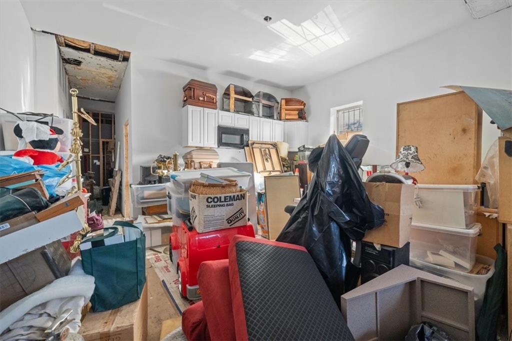 245 Bond Street Brooklyn, NY 11217 - Photo 9 of 11 a living room with furniture and a flat screen tv