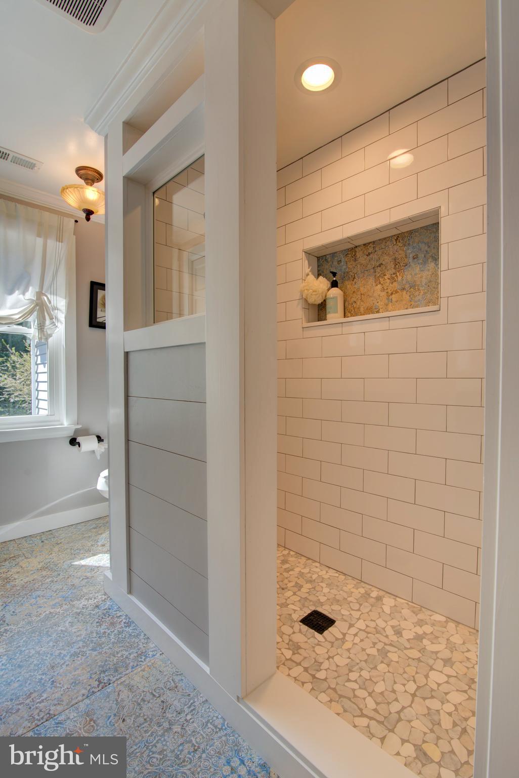 19411 Shelburne Glebe Road Leesburg, VA 20175 - Photo 31 of 58 Custom shower surround in hall bath