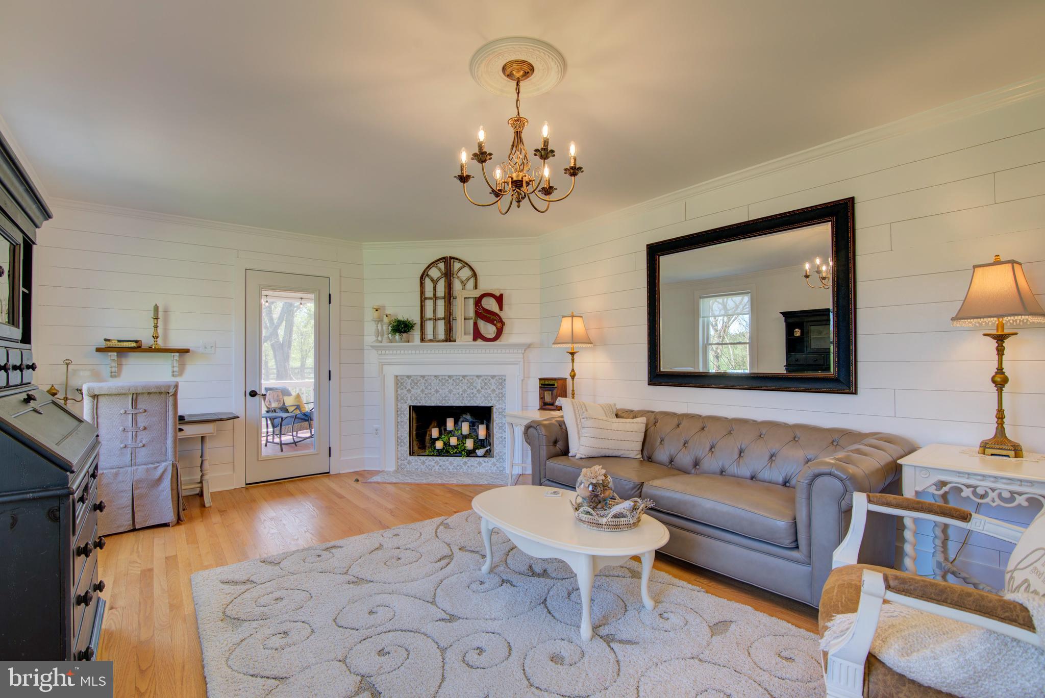 19411 Shelburne Glebe Road Leesburg, VA 20175 - Photo 5 of 58 Living room with wood-burning fireplace