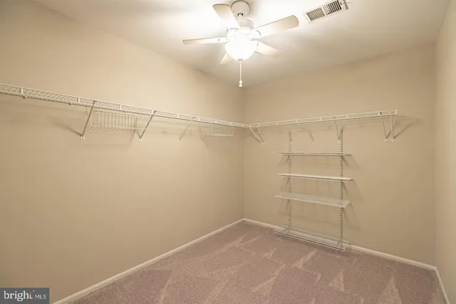 a view of a room with racks on the wall