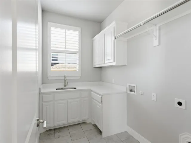 a view with cabinets and window