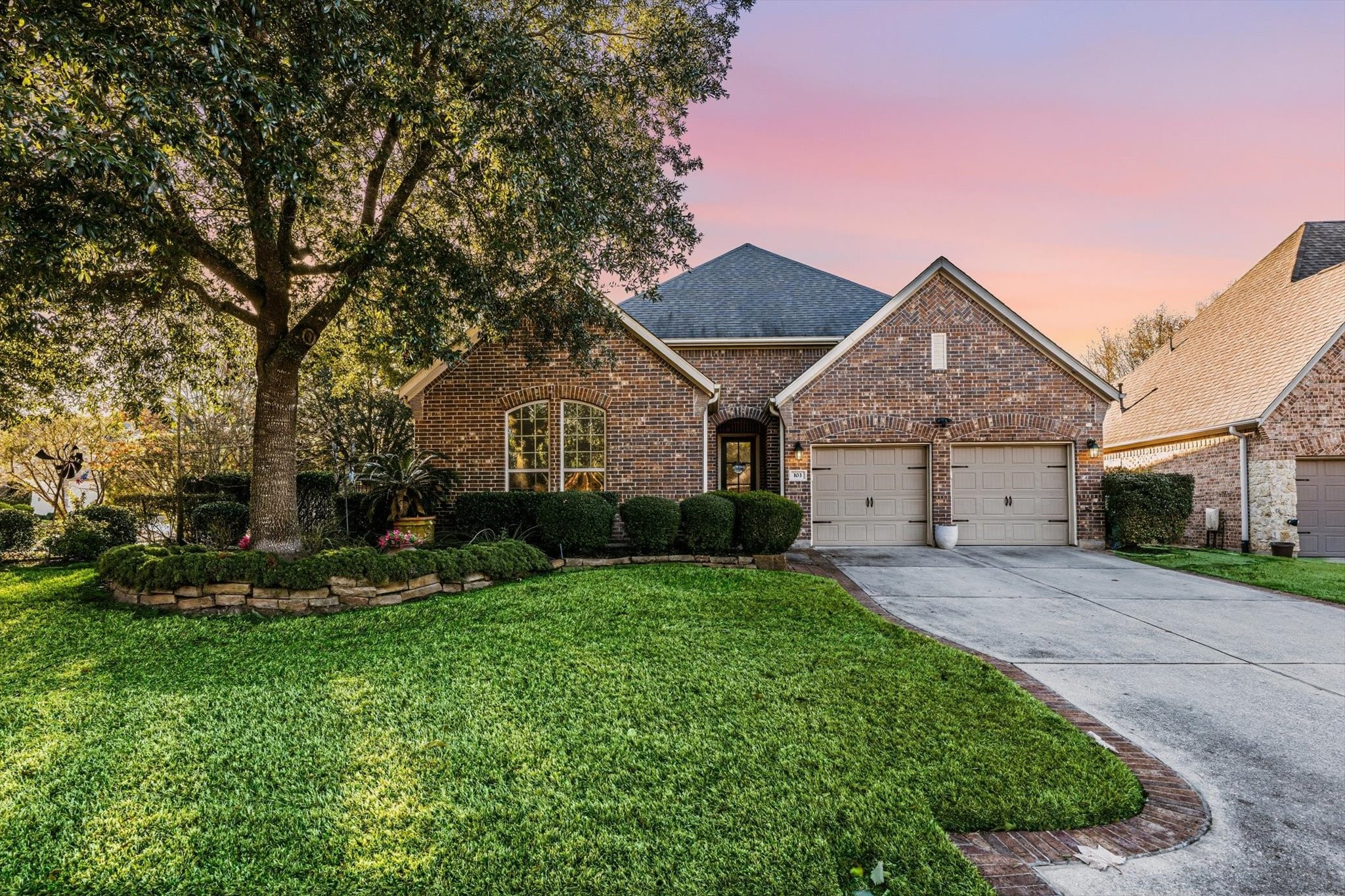 Welcome to 103 Fox Rindle Road, where timeless architecture meets an expansive wooded corner setting in sought-after Woodforest. A stately arrival framed by mature trees and manicured grounds sets the stage for the refined interiors that await.