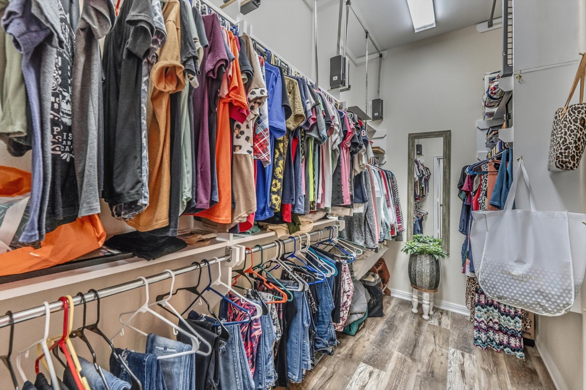 103 Fox Rindle Road Montgomery, TX 77316 - Photo 20 of 44 Closet Dreams! This boutique style Texas sized walk in closet designed with extensive hanging space and custom storage for a polished, organized wardrobe display.