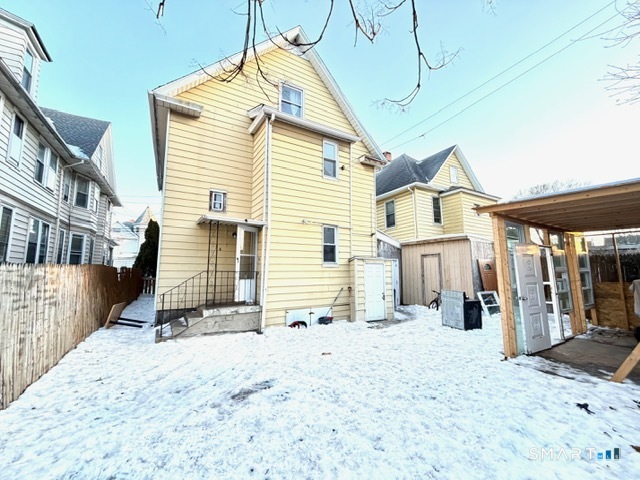 41-43 Washington Terrace Bridgeport, CT 06604 - Photo 11 of 18 a view of a house with a snow on the road