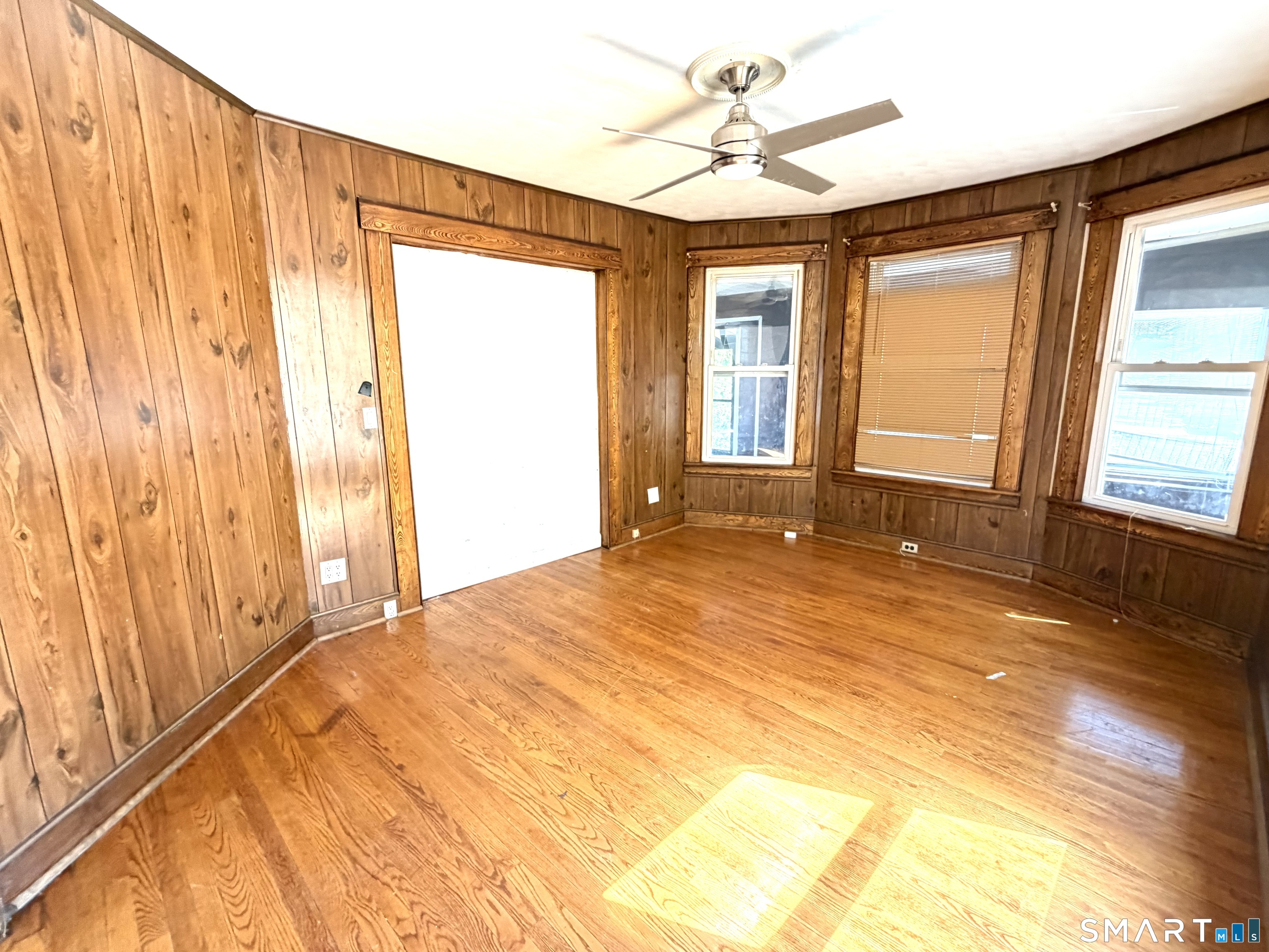 41-43 Washington Terrace Bridgeport, CT 06604 - Photo 18 of 18 a bedroom with a large bed and a large window