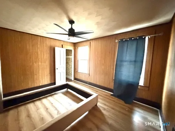 a kitchen with stainless steel appliances granite countertop a refrigerator a stove and a sink