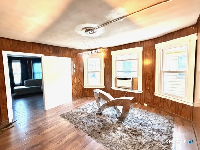41-43 Washington Terrace Bridgeport, CT 06604 - Photo 8 of 18 a view of a bedroom with furniture wooden floor and windows
