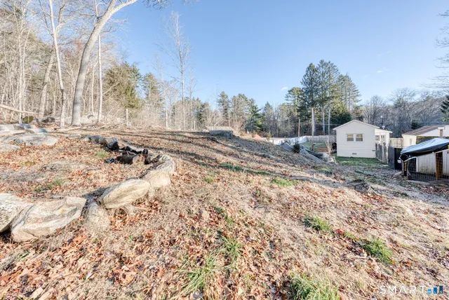 a view of a backyard with barn