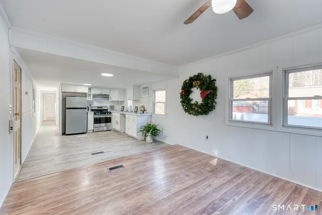 a view of kitchen and windows