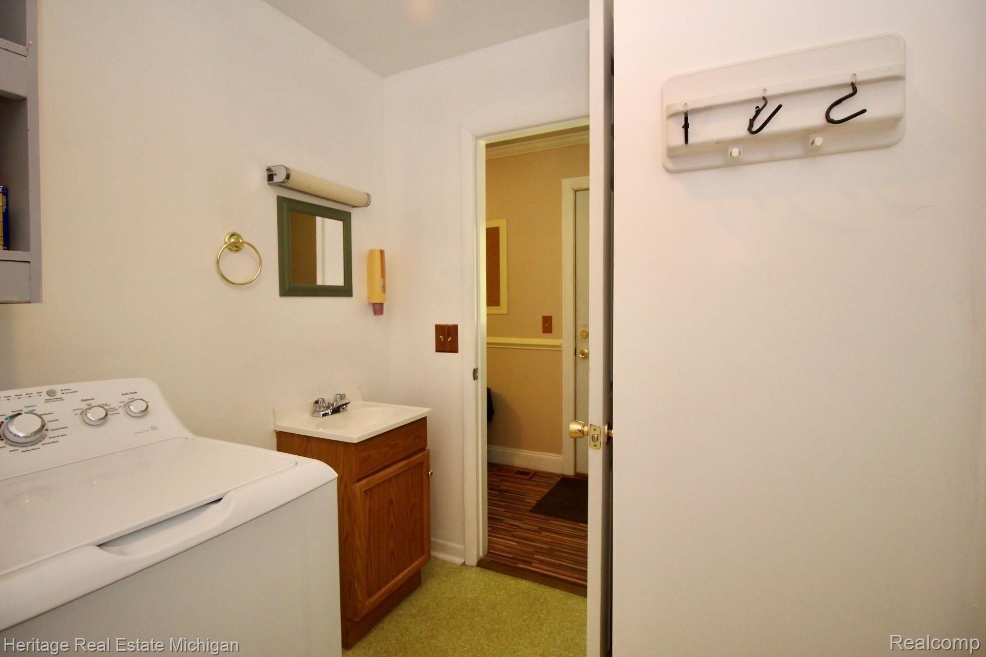 12701 Byron Road Byron, MI 48418 - Photo 25 of 54 Half bath & laundry room