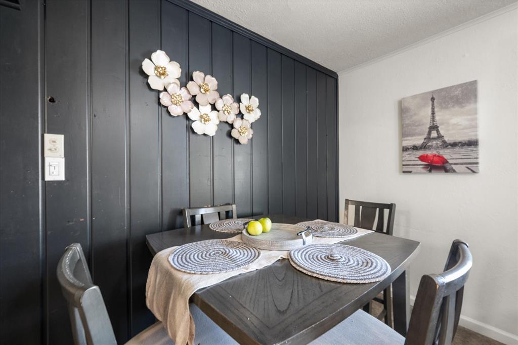 1704 Joyce Street Arlington, TX 76010 - Photo 6 of 19 a dining room with furniture and chandelier