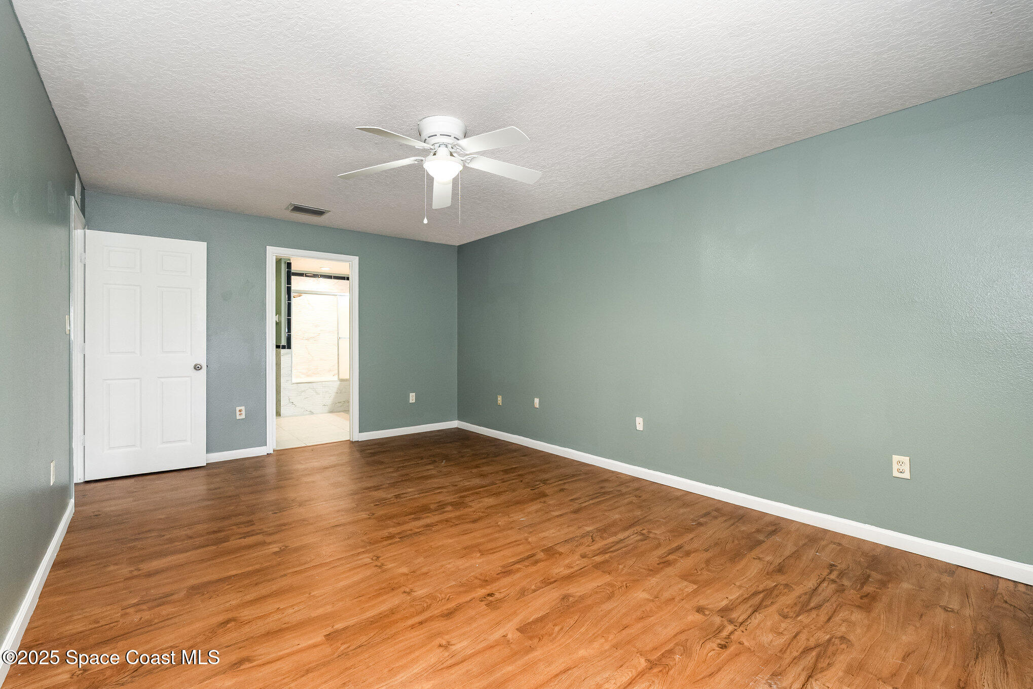 6105 Banyan Street Cocoa, FL 32927 - Photo 15 of 27 a view of an empty room with a window