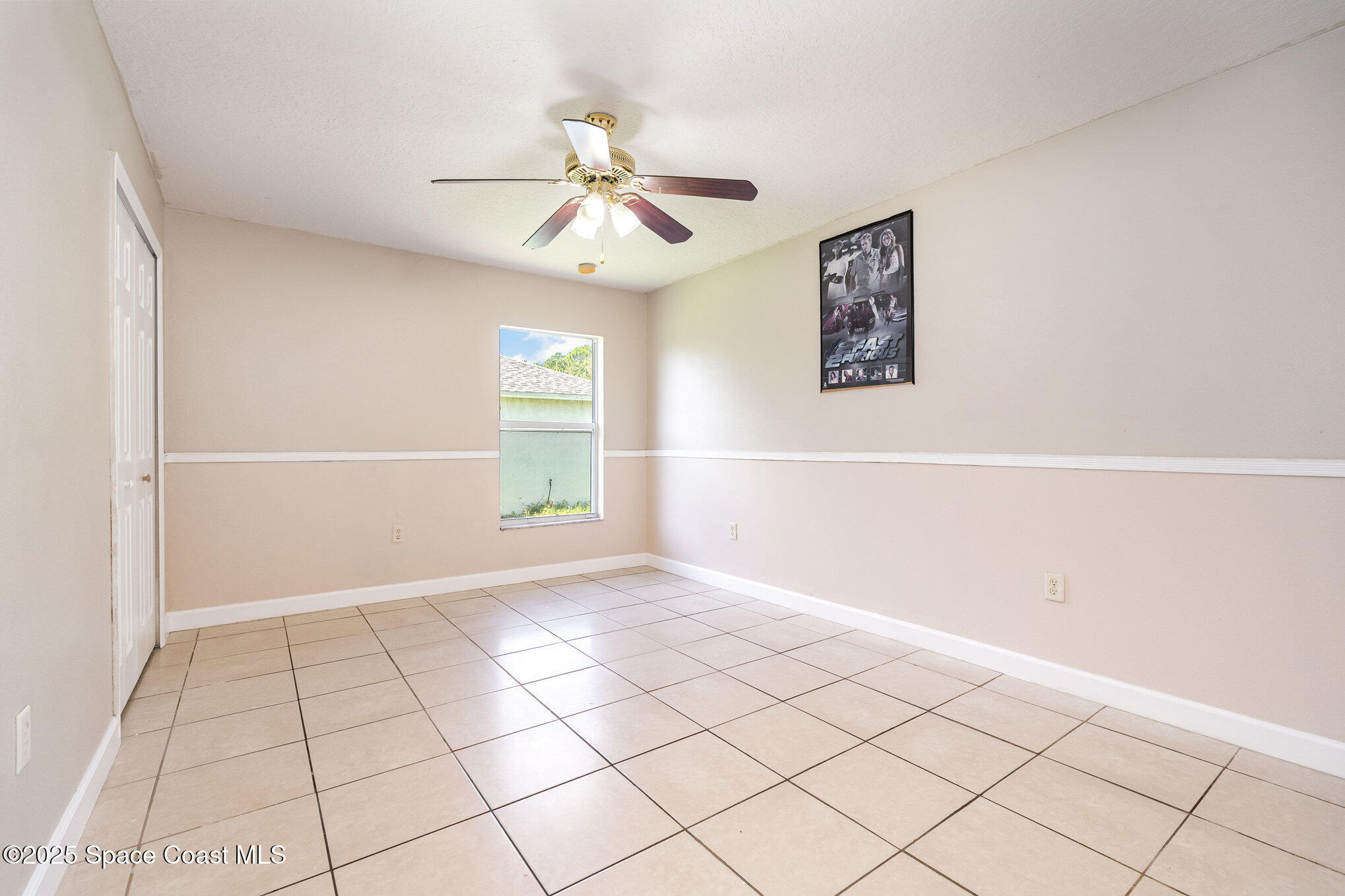 6105 Banyan Street Cocoa, FL 32927 - Photo 20 of 27 a view of an empty room with a window