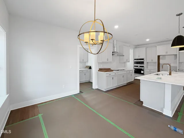 a view of a room with a hallway