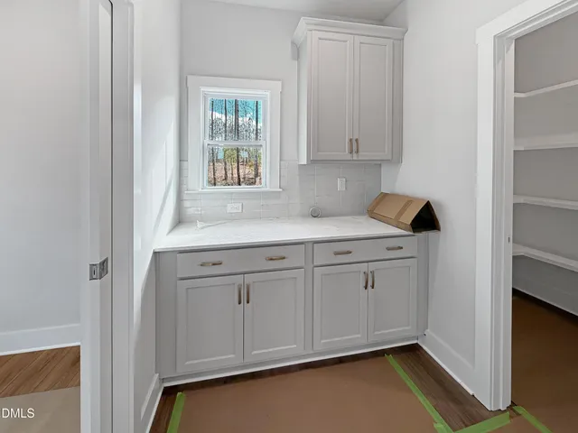 a view of an empty walk in closet